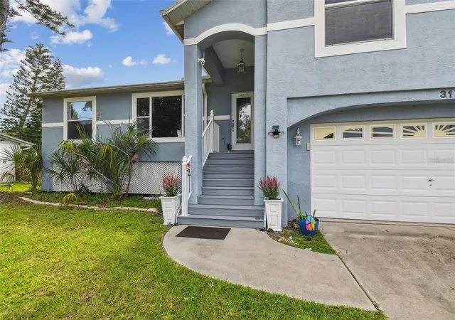 Photo 3 of Single family home for sale at 317 Shore Dr E, Oldsmar, FL 34677 | MLS# FC315737 | Listing updated on 2026-10-04