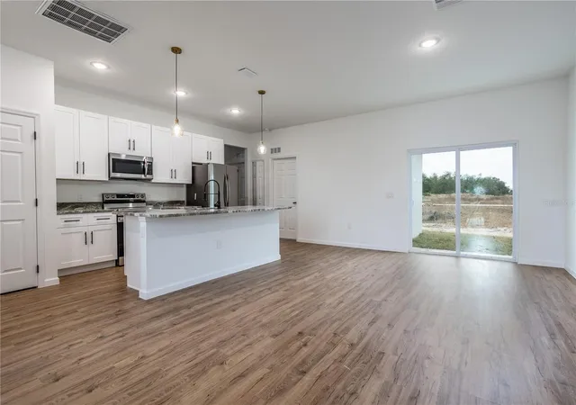 Photo 3 of Single family home for sale at 411 St Johns Ln, Kissimmee, FL 34759 | MLS# O6378041 | Listing updated on 2026-09-02