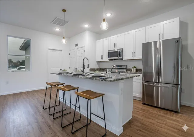 Photo 4 of Single family home for sale at 411 St Johns Ln, Kissimmee, FL 34759 | MLS# O6378041 | Listing updated on 2026-09-02