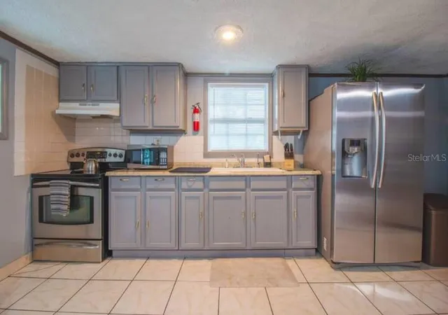 Photo 4 of Single family home for sale at 1731 Grayson Dr, Orlando, FL 32825 | MLS# O6378119 | Listing updated on 2026-09-04