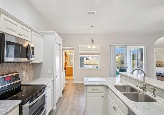 5th image of 639 Lakehaven Cir, Orlando, FL 32828 | MLS# O6378276