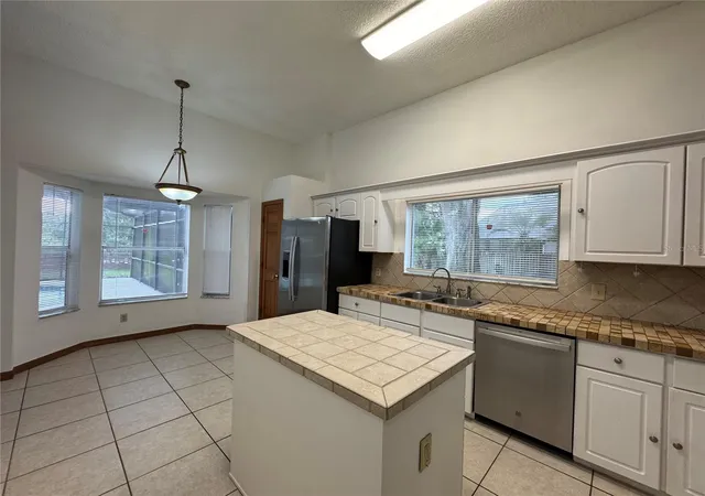 Photo 4 of Single family home for sale at 1206 Cornerstone Ct, Orlando, FL 32835 | MLS# O6378331 | Listing updated on 2026-08-31