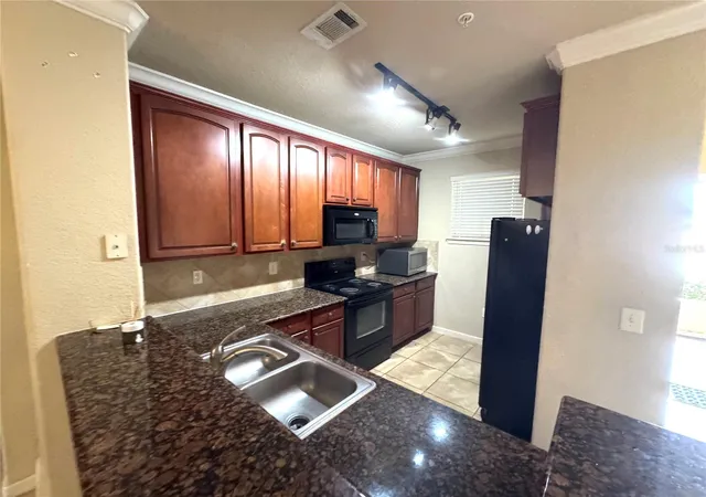 2nd image of 909 Charo Pkwy #1016, Davenport, FL 33897 | MLS# S5142823