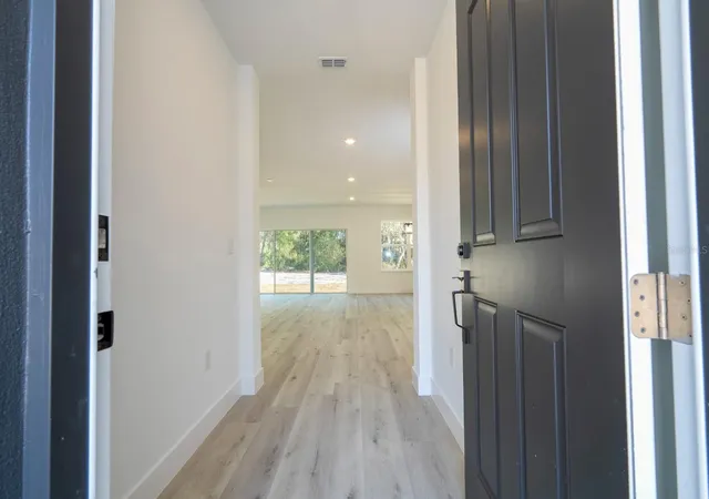 Photo 3 of Single family home for sale at 1129 Edinburgh St, North Port, FL 34288 | MLS# O6378516 | Listing updated on 2026-10-09