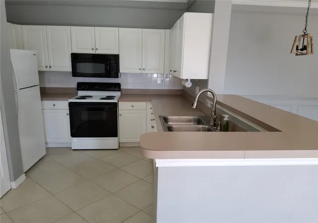 Photo 3 of Condo for sale at 4333 Bayside Village Dr #224, Tampa, FL 33615 | MLS# TB8471012 | Listing updated on 2026-03-18