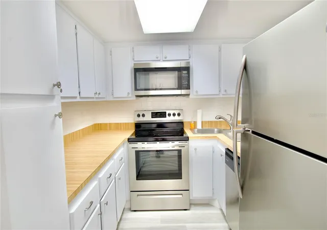 Photo 3 of Condo for sale at 5135 Gemstone Dr #202, New Port Richey, FL 34652 | MLS# W7882629 | Listing updated on 2026-09-23