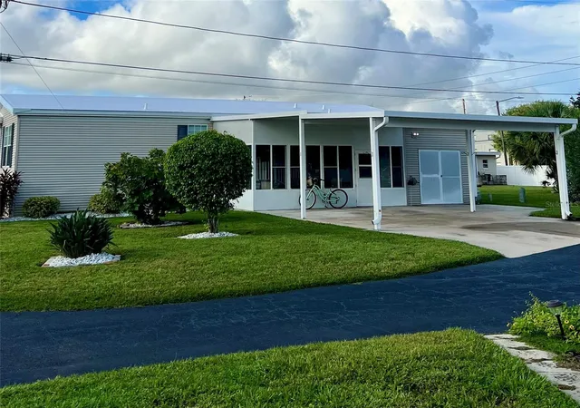 Photo 2 of Manufactured home for sale at 7316 Americana Dr Ne #146, Saint Petersburg, FL 33702 | MLS# TB8471847 | Listing updated on 2026-10-06