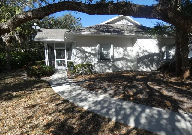 Photo 1 of Single family home for sale at 1448 Winding Oak Dr, Port Charlotte, FL 33948 | MLS# R4910656 | Listing updated on 2026-07-01