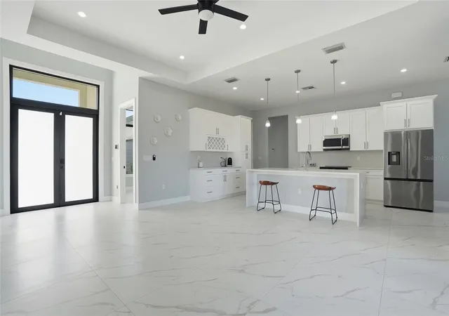 Photo 4 of Single family home for sale at 2415 56th Avenue NE, Naples, FL 34120 | MLS# TB8472335 | Listing updated on 2026-05-24