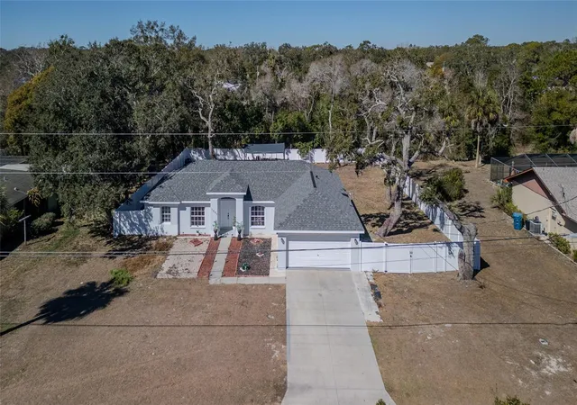 Photo 2 of Single family home for sale at 1007 Tryon Cir, Spring Hill, FL 34606 | MLS# TB8472422 | Listing updated on 2026-09-20