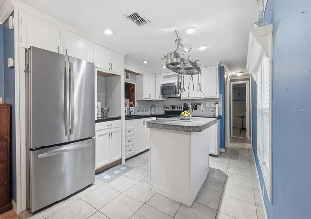 Photo 4 of Manufactured home for sale at 10565 Bessemer St, New Port Richey, FL 34654 | MLS# TB8472454 | Listing updated on 2026-08-29