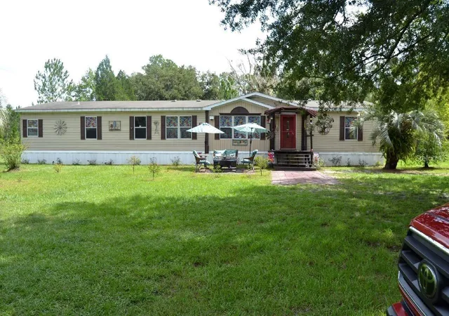 Photo 1 of Manufactured home for sale at 13921 Pine Meadow Rd, Kathleen, FL 33849 | MLS# S5143165 | Listing updated on 2026-09-23