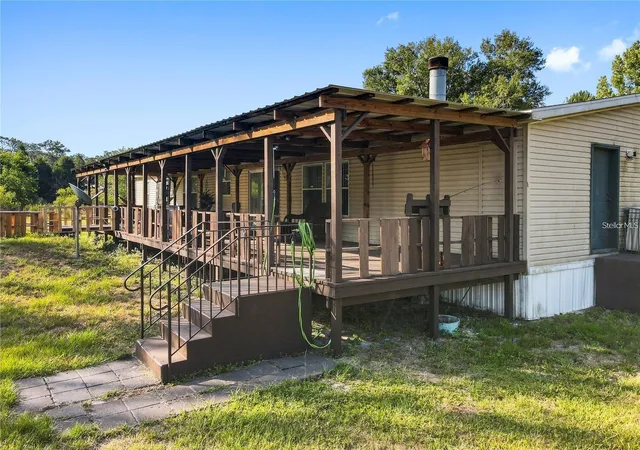 Photo 2 of Manufactured home for sale at 13921 Pine Meadow Rd, Kathleen, FL 33849 | MLS# S5143165 | Listing updated on 2026-09-23