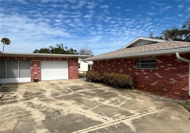 Photo 4 of Single family home for sale at 2004 S Riverside Dr, Edgewater, FL 32141 | MLS# TB8472785 | Listing updated on 2026-08-15