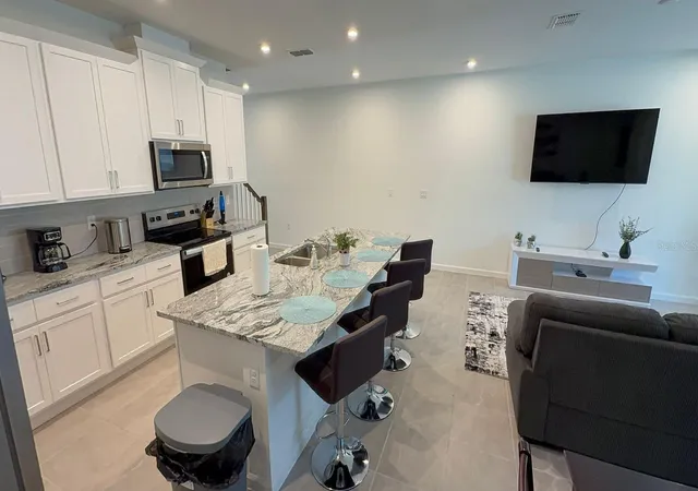 Listing Photo 1 - Condo for sale in building located at 2334 Zaballina Pl, KISSIMMEE, FL 34747 - Unit #2343