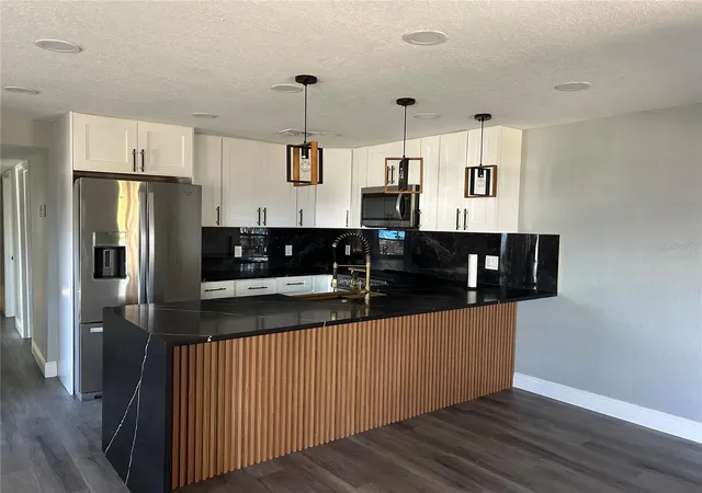 Photo 1 of Sale Pending at 2119 E Ellicott, Tampa, FL 33610 | MLS# TB8473065 | Listing updated on 2026-10-18