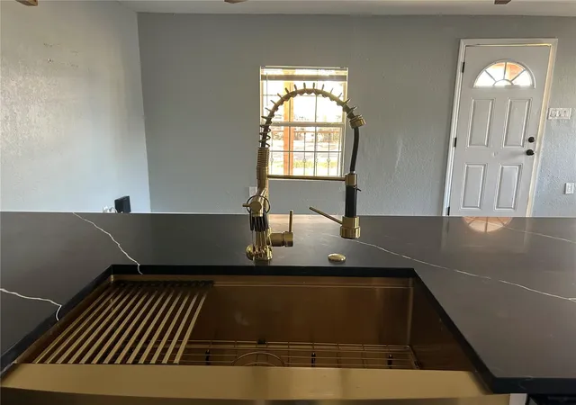 Photo 2 of Sale Pending at 2119 E Ellicott, Tampa, FL 33610 | MLS# TB8473065 | Listing updated on 2026-10-18