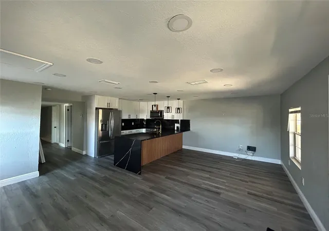 Photo 3 of Sale Pending at 2119 E Ellicott, Tampa, FL 33610 | MLS# TB8473065 | Listing updated on 2026-10-18