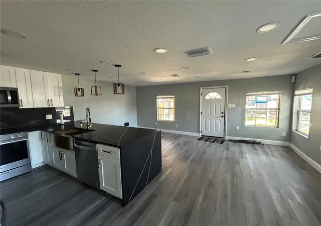 Photo 4 of Sale Pending at 2119 E Ellicott, Tampa, FL 33610 | MLS# TB8473065 | Listing updated on 2026-10-18
