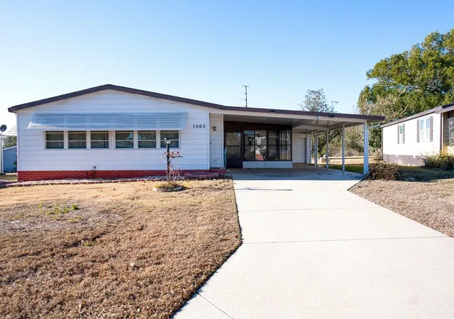 Photo 1 of Manufactured home for sale at 1863 W Schwartz Blvd, Lady Lake, FL 32159 | MLS# OM718202 | Listing updated on 2026-08-07