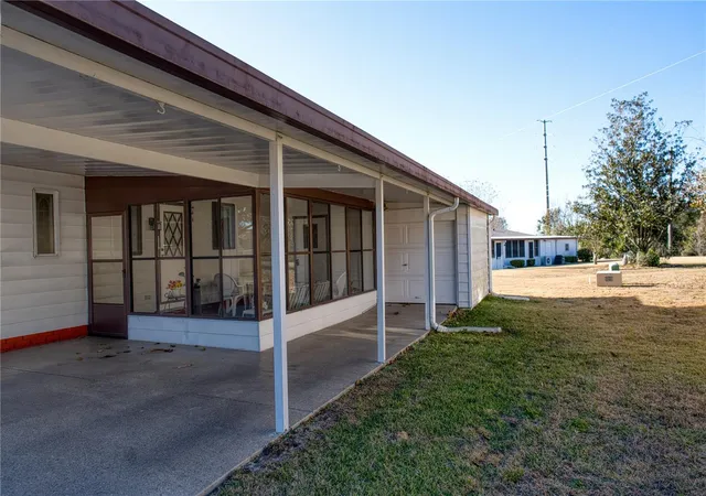 Photo 3 of Manufactured home for sale at 1863 W Schwartz Blvd, Lady Lake, FL 32159 | MLS# OM718202 | Listing updated on 2026-08-07