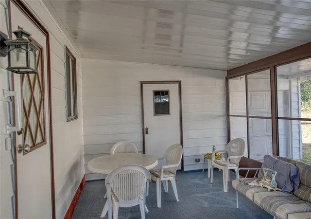 Photo 3 of Manufactured home for sale at 1863 W Schwartz Blvd, Lady Lake, FL 32159 | MLS# OM718202 | Listing updated on 2026-08-07