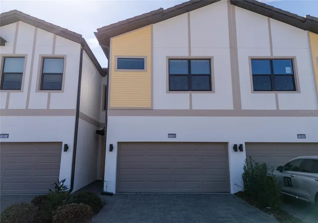 Photo 1 of Townhouse for sale at 10580 Ebb Tide Ln, Orlando, FL 32821 | MLS# S5143244 | Listing updated on 2026-09-22