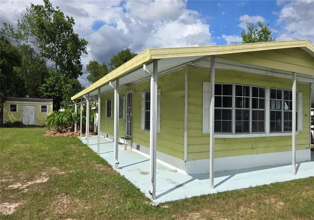 Photo 2 of Manufactured home for sale at 5921 Sw 63rd Street, Ocala, FL 34474 | MLS# OM718221 | Listing updated on 2026-09-02