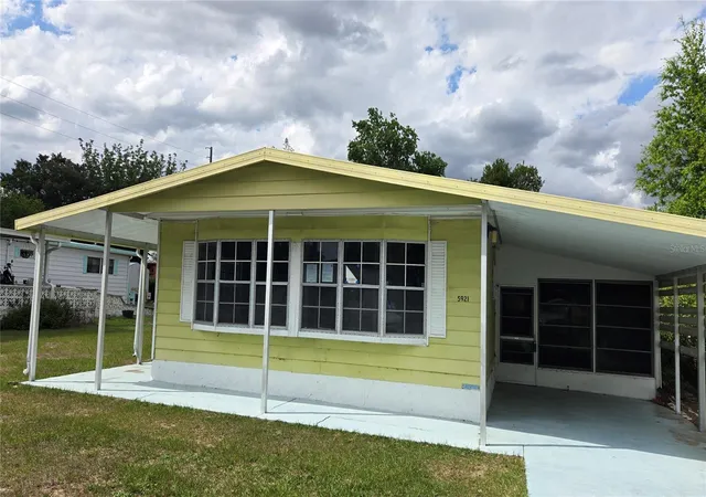 Photo 1 of Manufactured home for sale at 5921 Sw 63rd Street, Ocala, FL 34474 | MLS# OM718221 | Listing updated on 2026-09-02