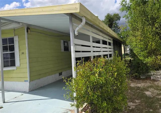 Photo 3 of Manufactured home for sale at 5921 SW 63rd Street, Ocala, FL 34474 | MLS# OM718221 | Listing updated on 2026-09-02