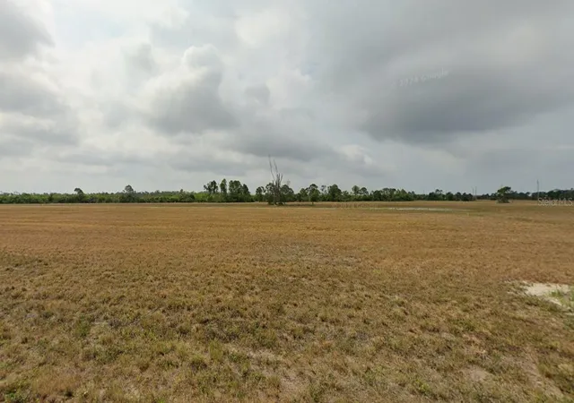 Photo 1 of Land for sale at 12252 Tripletail Dr, Port Charlotte, FL 33981 | MLS# C7521556 | Listing updated on 2026-02-25