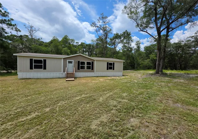 1st image of 7513 W Dunklin St, Dunnellon, FL 34433 | MLS# OM718231