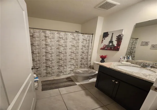 Photo 4 of Single family home for sale at 1075 Griffon Ave, Lake Alfred, FL 33850 | MLS# TB8473829 | Listing updated on 2026-07-11