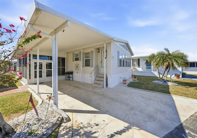 Photo 2 of Manufactured home for sale at 10100 Burnt Store Rd #63, Punta Gorda, FL 33950 | MLS# C7521692 | Listing updated on 2026-03-11