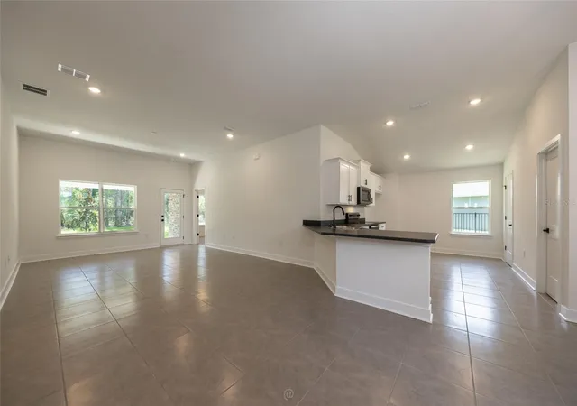 3rd image of 77 Pickering Dr, Palm Coast, FL 32164 | MLS# FC316011