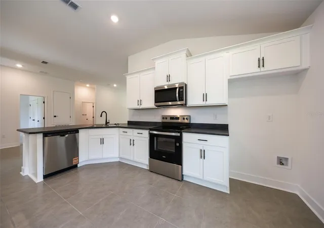 5th image of 77 Pickering Dr, Palm Coast, FL 32164 | MLS# FC316011
