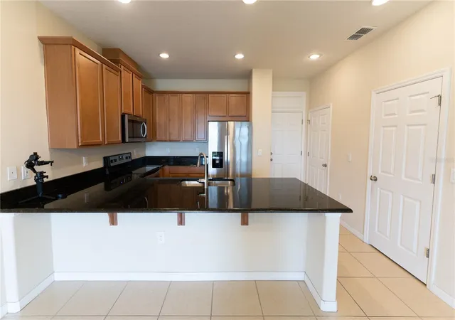 Photo 4 of Townhouse for sale at 2617 Giardino Loop, Kissimmee, FL 34741 | MLS# S5143495 | Listing updated on 2026-02-14