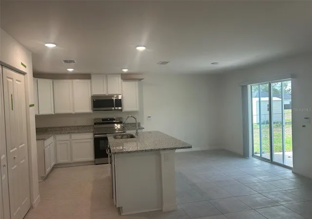 Photo 4 of Single family home for sale at 5237 SW 165th Street Rd, Ocala, FL 34473 | MLS# O6381418 | Listing updated on 2026-09-21
