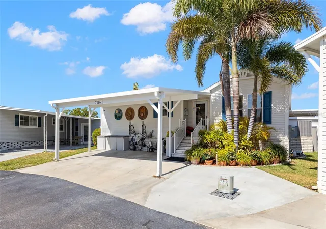 Photo 2 of Manufactured home for sale at 7166 Mount Arlington Dr Ne #418, Saint Petersburg, FL 33702 | MLS# TB8475158 | Listing updated on 2026-09-08