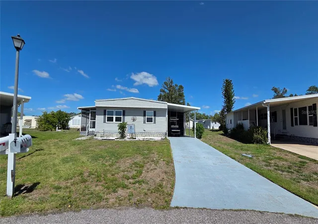 Photo 2 of Manufactured home for sale at 6881 Holo Ct, North Port, FL 34287 | MLS# A4682136 | Listing updated on 2026-09-17