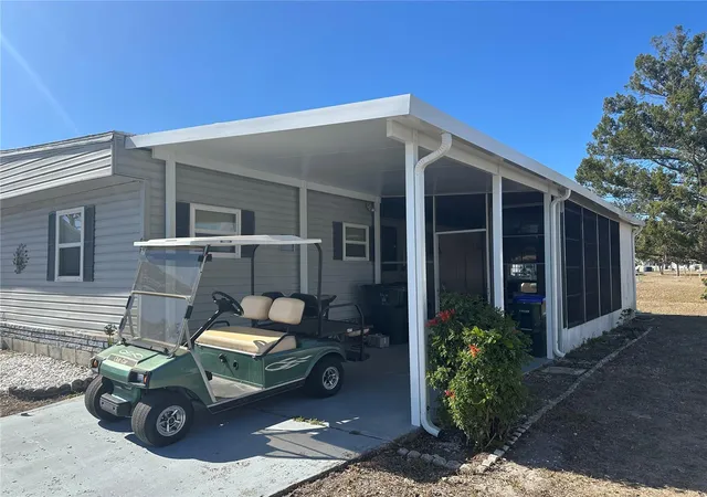 Photo 3 of Manufactured home for sale at 6881 Holo Ct, North Port, FL 34287 | MLS# A4682136 | Listing updated on 2026-09-17