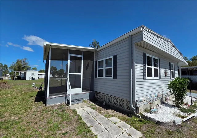 Photo 3 of Manufactured home for sale at 6881 Holo Ct, North Port, FL 34287 | MLS# A4682136 | Listing updated on 2026-09-17