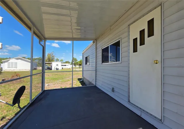 Photo 4 of Manufactured home for sale at 6881 Holo Ct, North Port, FL 34287 | MLS# A4682136 | Listing updated on 2026-09-17