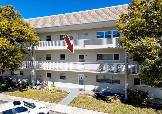 Photo 1 of Condo for sale at 2440 World Pkwy Blvd #38, Clearwater, FL 33763 | MLS# TB8475430 | Listing updated on 2026-09-16