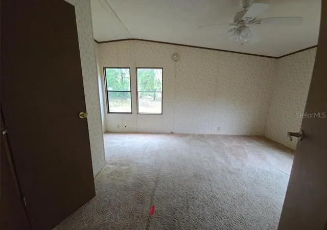 3rd image of 12906 Nw 38Th Ave, Reddick, FL 32686 | MLS# OM718679