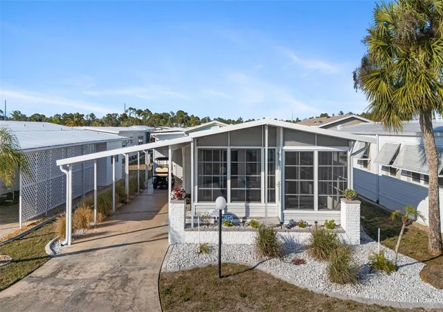 Photo 1 of Manufactured home for sale at 107 Tortola Way, North Port, FL 34287 | MLS# C7521889 | Listing updated on 2026-09-20