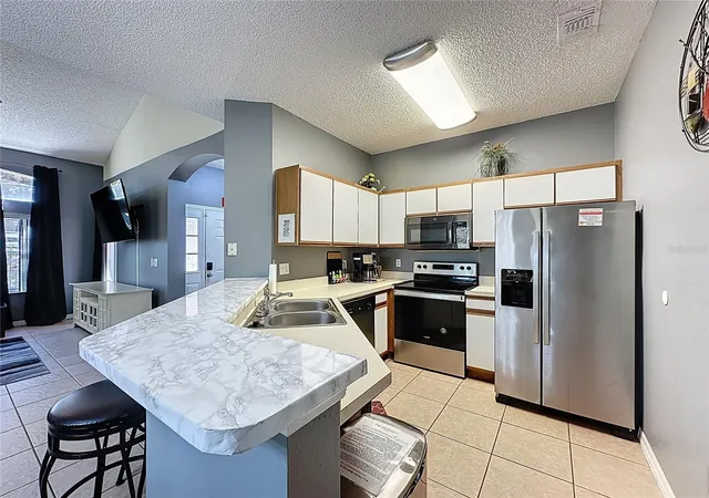 Photo 3 of Townhouse for sale at 8401 Crystal Cvs Loop, Kissimmee, FL 34747 | MLS# O6382485 | Listing updated on 2026-08-26
