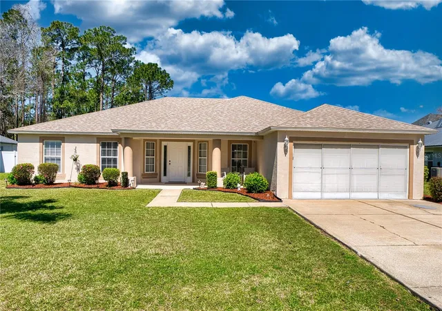 1st image of 20 Burning Wick Pl, Palm Coast, FL 32137 | MLS# FC316160