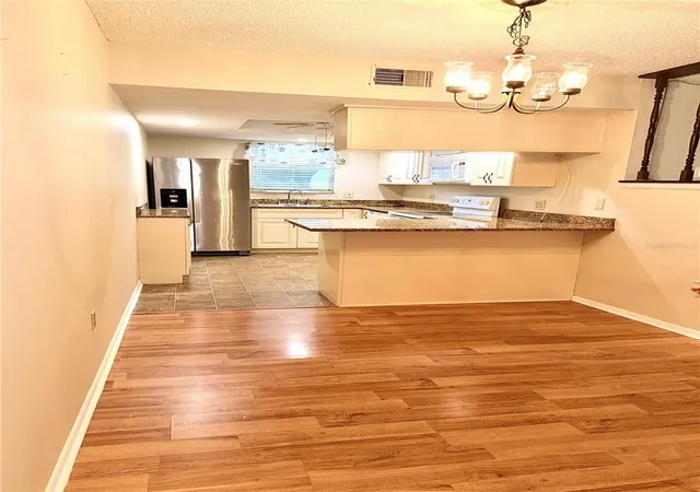 Photo 1 of Condo for sale at 4140 Passport Ln #101, New Port Richey, FL 34653 | MLS# W7883079 | Listing updated on 2026-09-26
