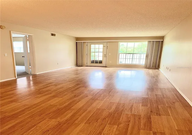 Photo 2 of Condo for sale at 4140 Passport Ln #101, New Port Richey, FL 34653 | MLS# W7883079 | Listing updated on 2026-09-26